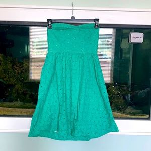 Small strapless light green dress.